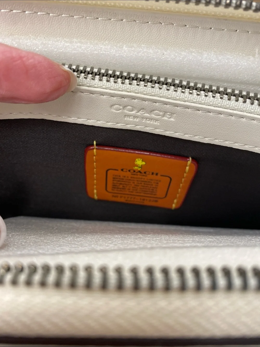 Coach White Pebbled Leather Zip Wallet with Snoopy and Woodstock Graphic